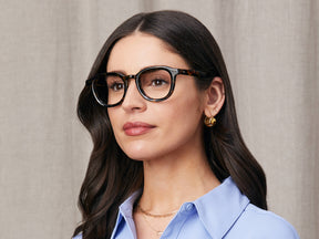 Model is wearing The DAHVEN in size 50 in Tortoise