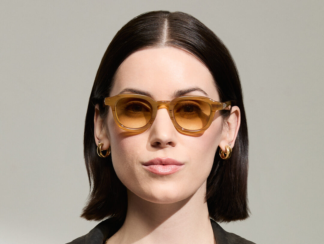 Model is wearing The DAHVEN in Blonde in size 44 with Chestnut Fade Tinted Lenses