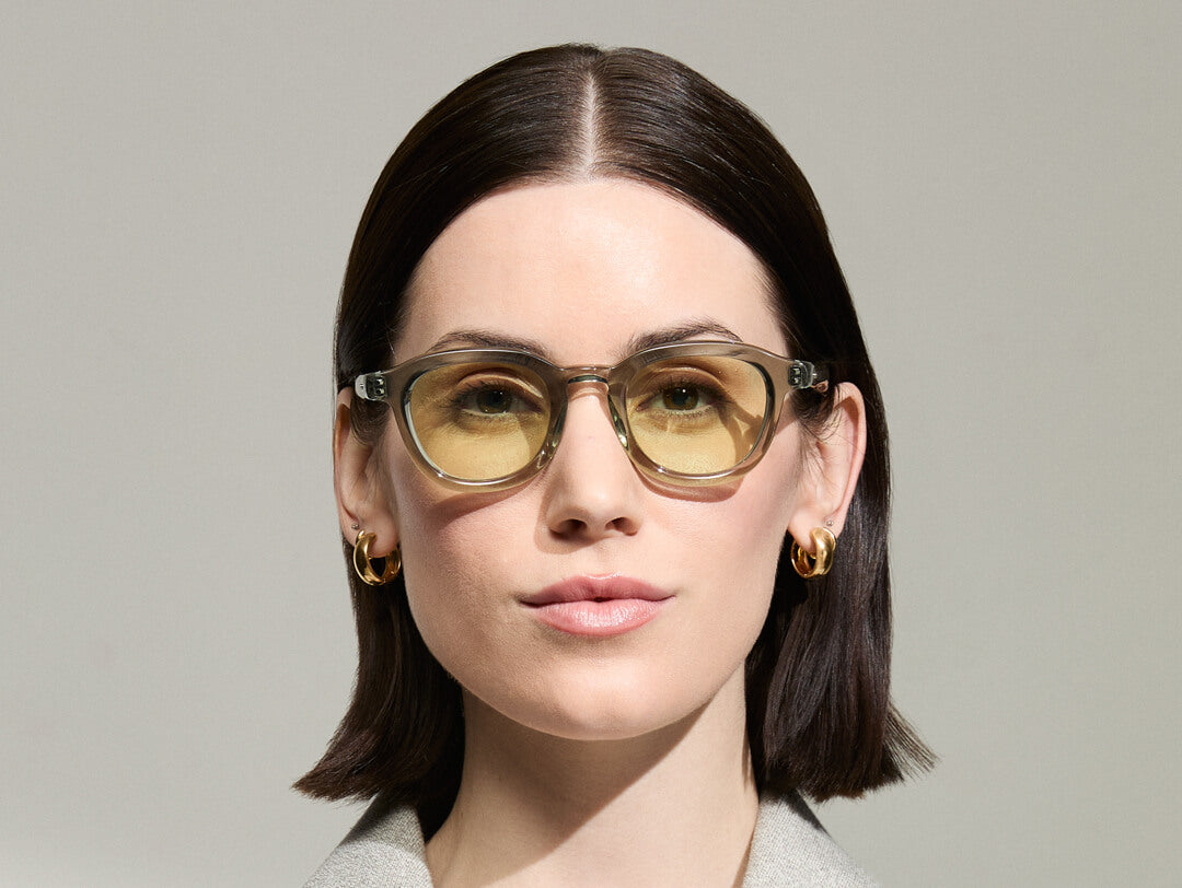Model is wearing The DAHVEN in Sage in size 47 with Limelight Tinted Lenses