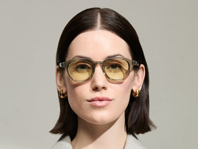 Model is wearing The DAHVEN in Sage in size 47 with Limelight Tinted Lenses