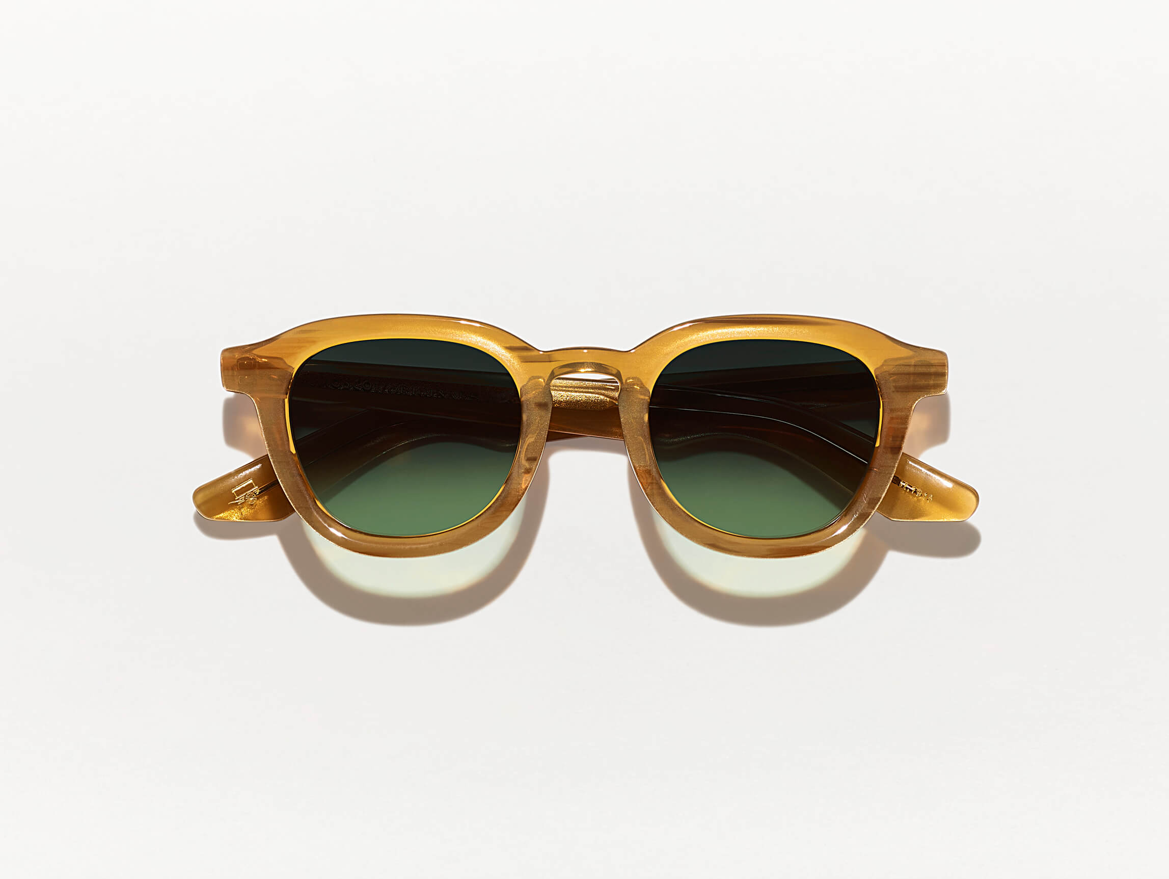 #color_blonde | The DAHVEN SUN in Blonde with Forest Wood Tinted Lenses