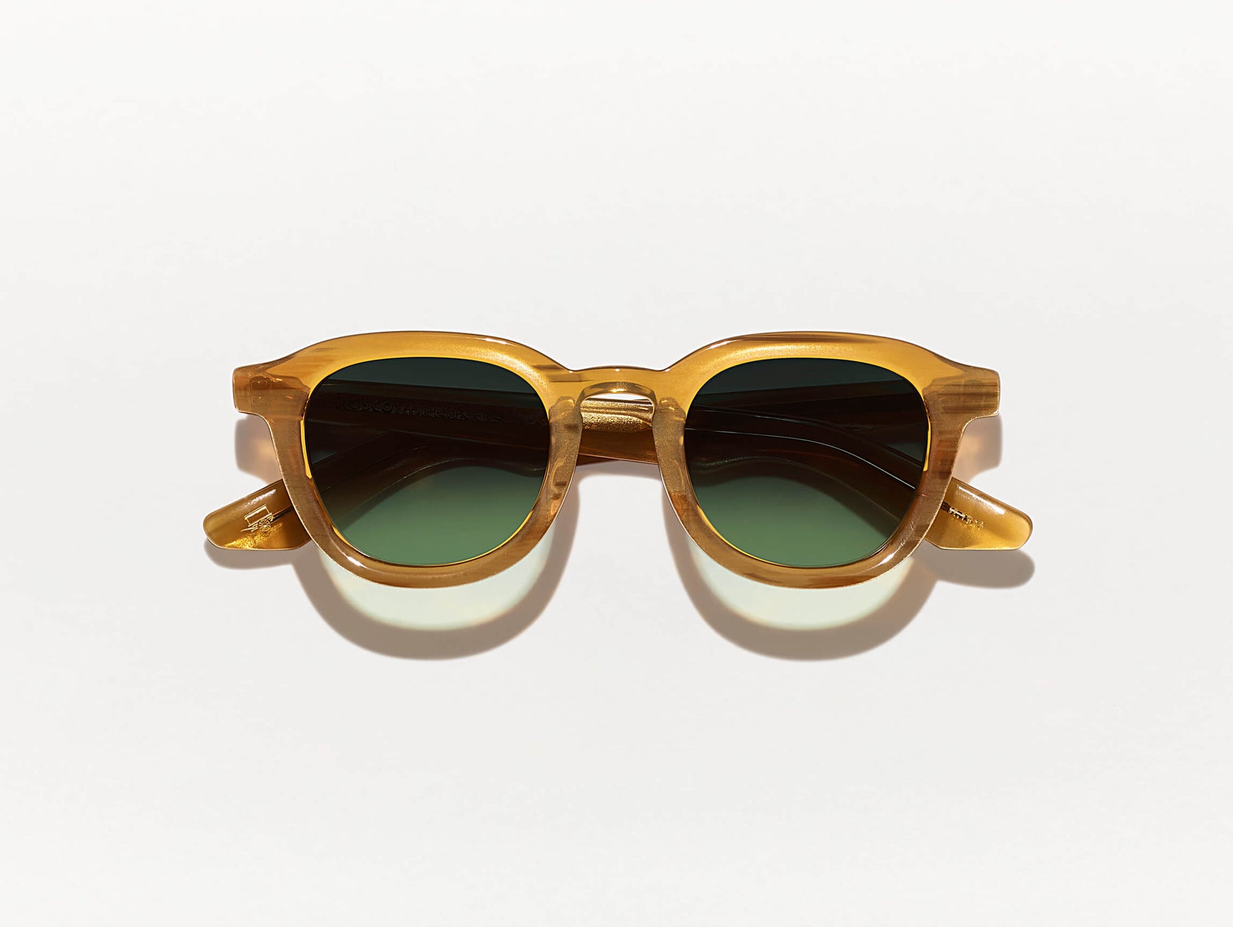 The DAHVEN SUN in Blonde with Forest Wood Tinted Lenses