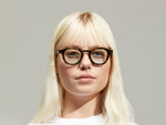 Model is wearing The DAHVEN in Tortoise size 44 with BLUE+ Tinted Lenses
