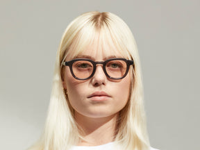 Model is wearing The DAHVEN in Grey size 44 with ROSE+ Tinted Lenses