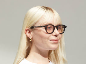 Model is wearing The DAHVEN in Grey size 44 with ROSE+ Tinted Lenses