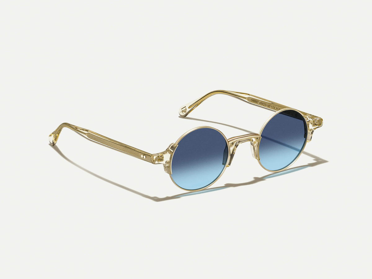 The DIBBIK SUN in Flesh with Denim Blue Tinted Lenses