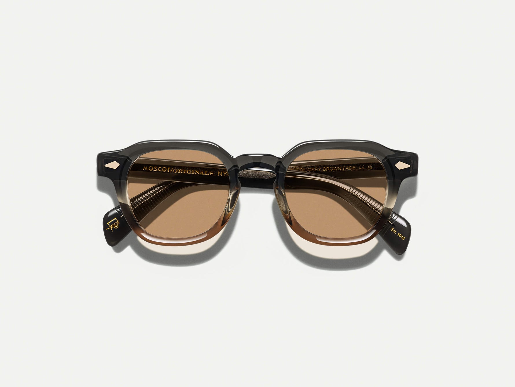 The DOLT in Grey-Brown Fade with AMBER+ Lenses