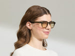 Model is wearing The DOLT in Khaki in size 49 with AMBER+ Lenses