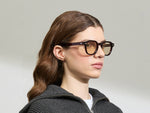 Model is wearing The DOLT in Burgundy in size 49 with AMBER+ Lenses