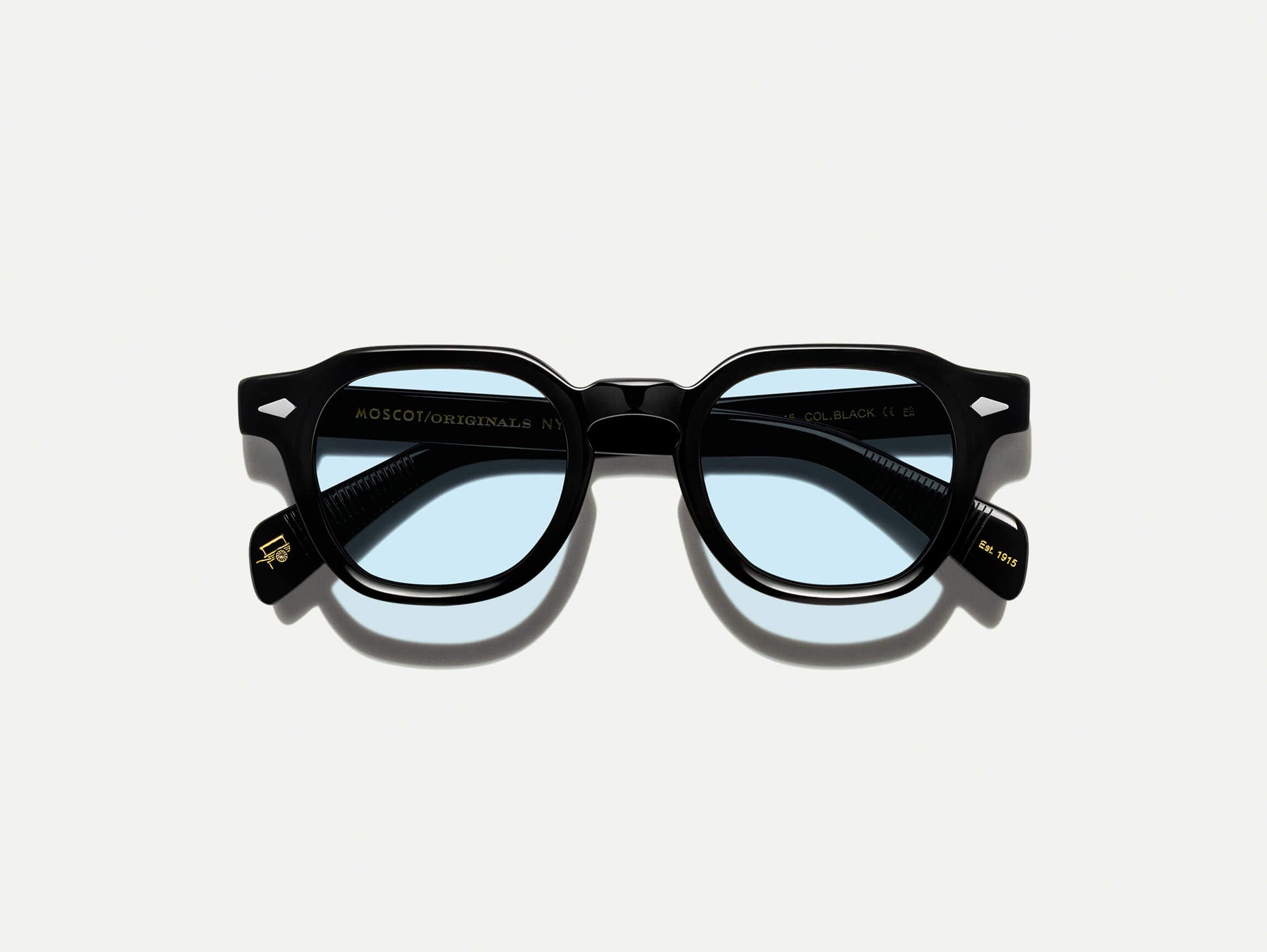 The DOLT in Black with Bel Air Blue Tinted Lenses
