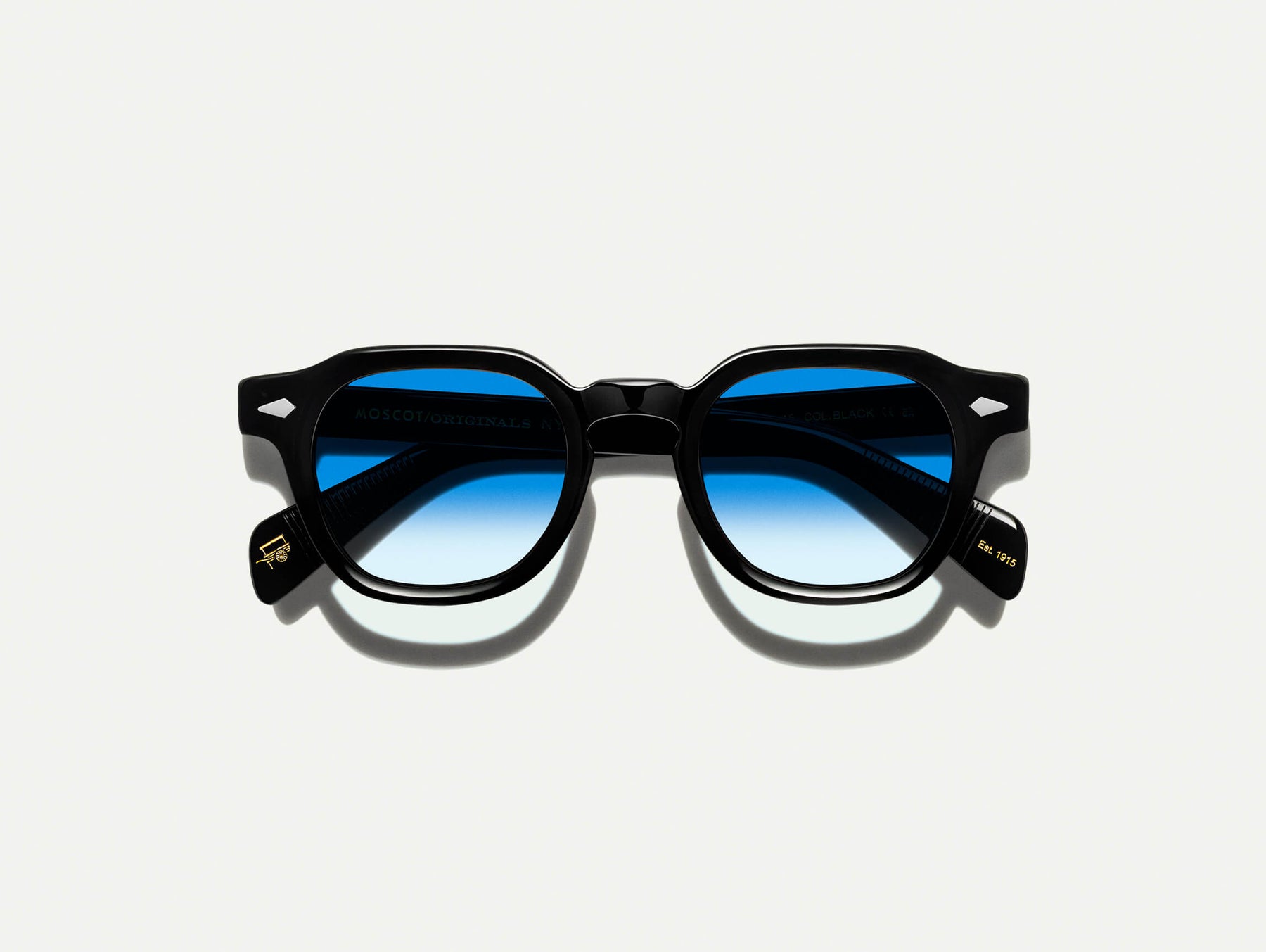 The DOLT in Black with Broadway Blue Fade Tinted Lenses