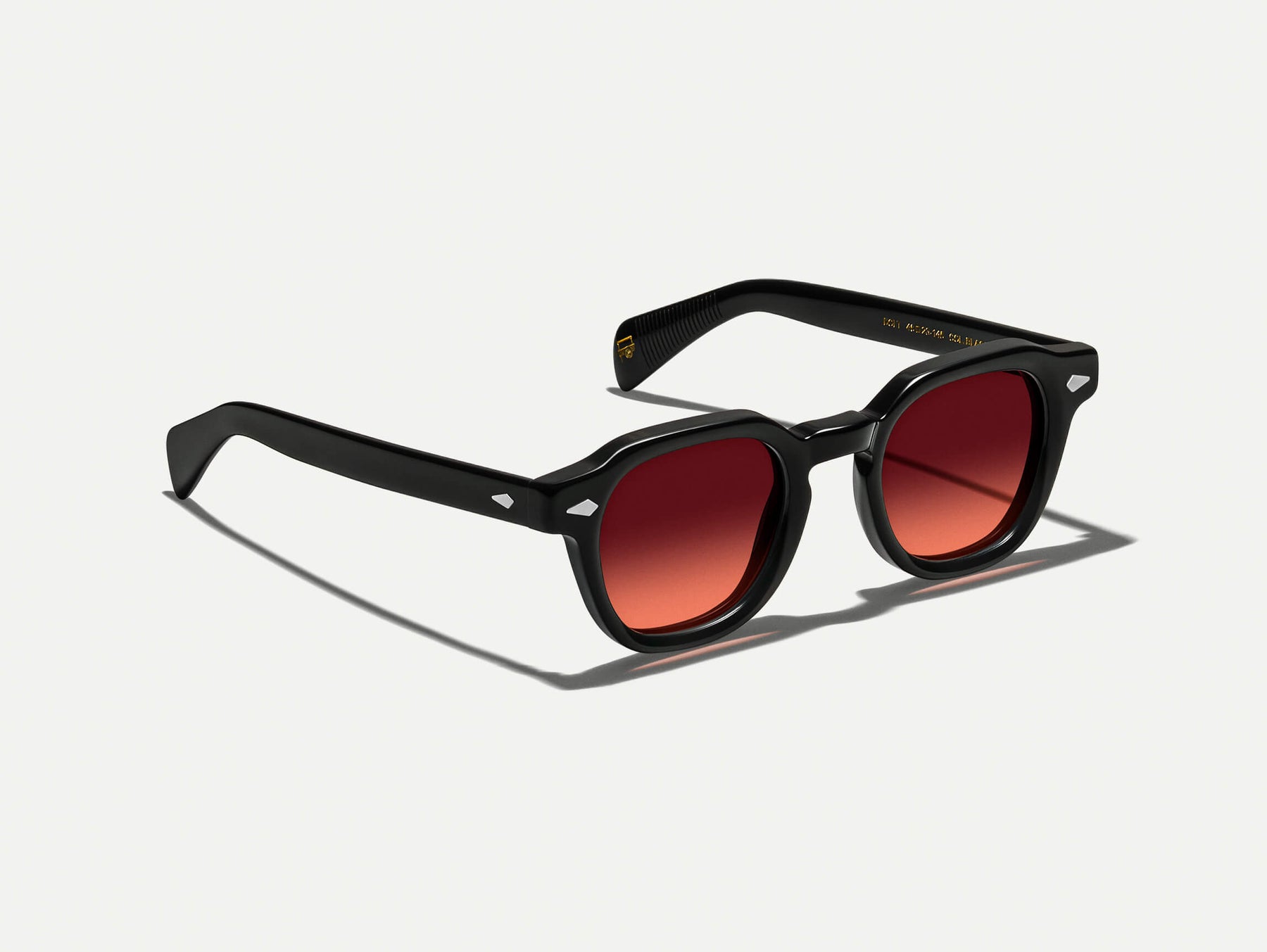 The DOLT in Black with Cabernet Tinted Lenses