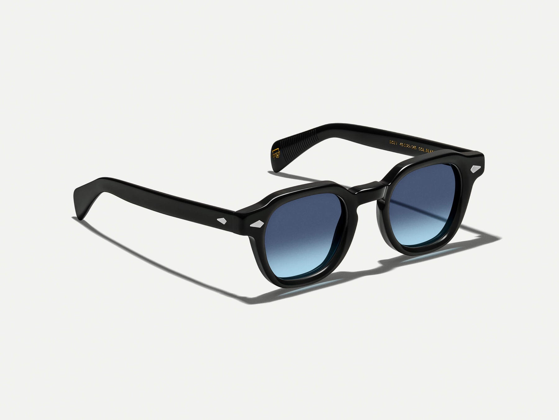 The DOLT in Black with Denim Blue Tinted Lenses