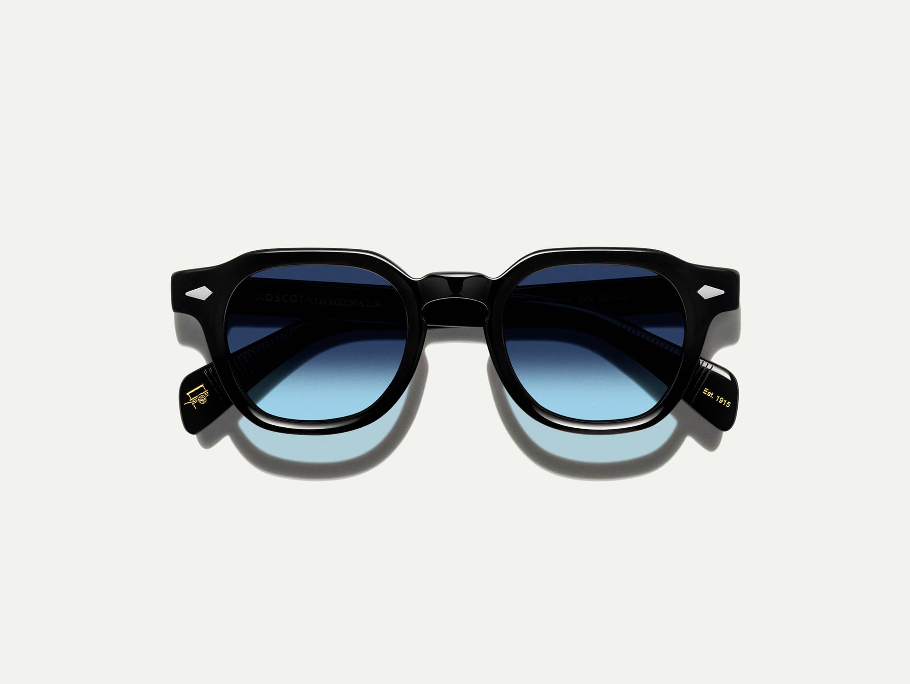 The DOLT in Black with Denim Blue Tinted Lenses