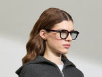 Model is wearing The DOLT in Burgundy in size 49 with BLUE+ Lenses
