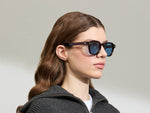 Model is wearing The DOLT in Burgundy in size 49 with BLUE+ Lenses