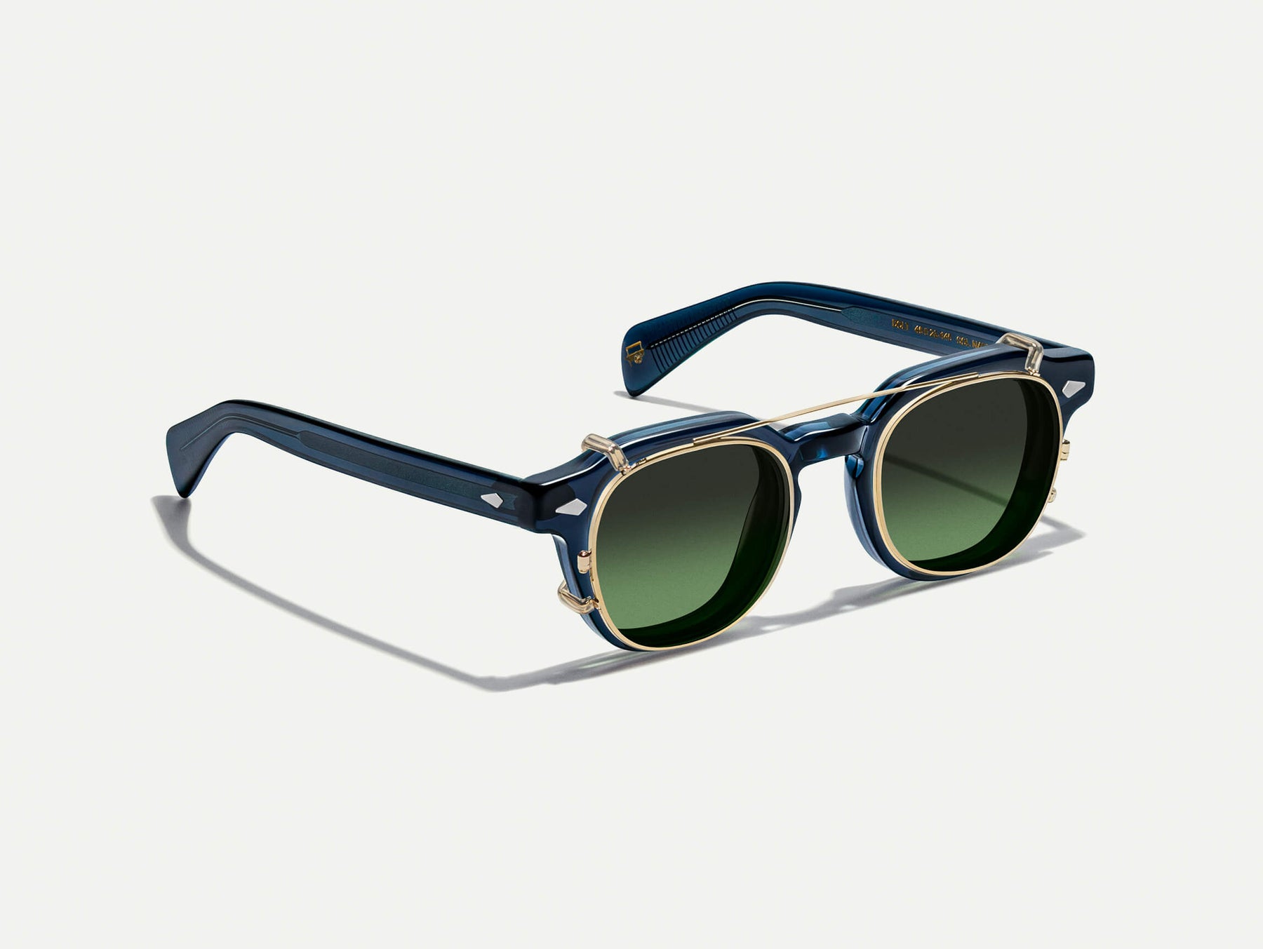 The DOLT CLIP in Gold with Forest Wood Tinted Lenses
