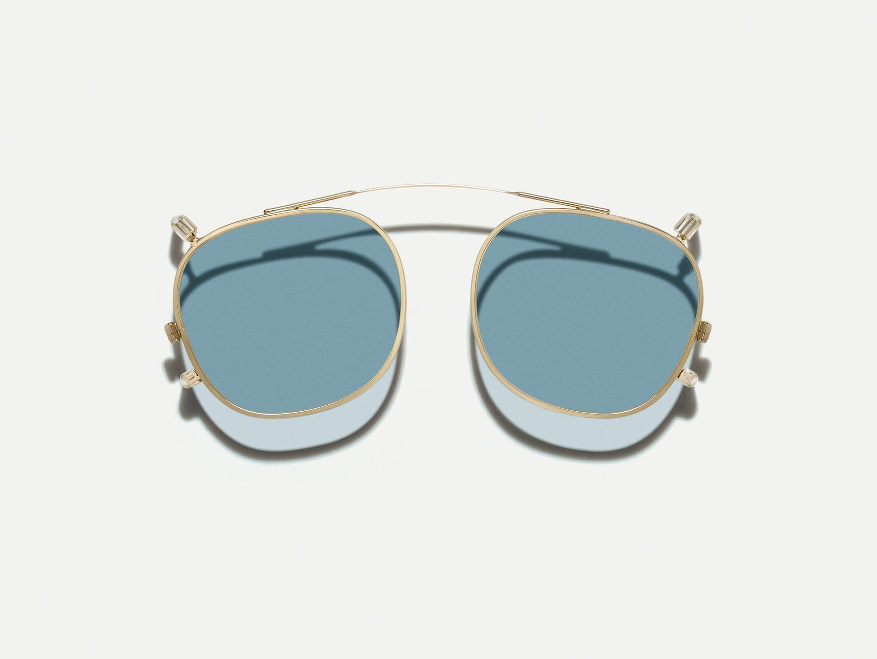 #color_gold | The DOLT CLIP LIMITED EDITION in Gold with Blue Tinted Lenses