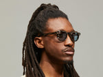 Model is wearing the DOLT Limited Edition Bundle in size 46 in Bark