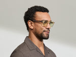Model is wearing The DOLT in Flesh/Tortoise in size 46 with GREEN+ Lenses