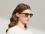 Model is wearing The DOLT in Khaki in size 49 with GREEN+ Lenses