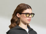 Model is wearing The DOLT in Burgundy in size 49 with GREEN+ Lenses