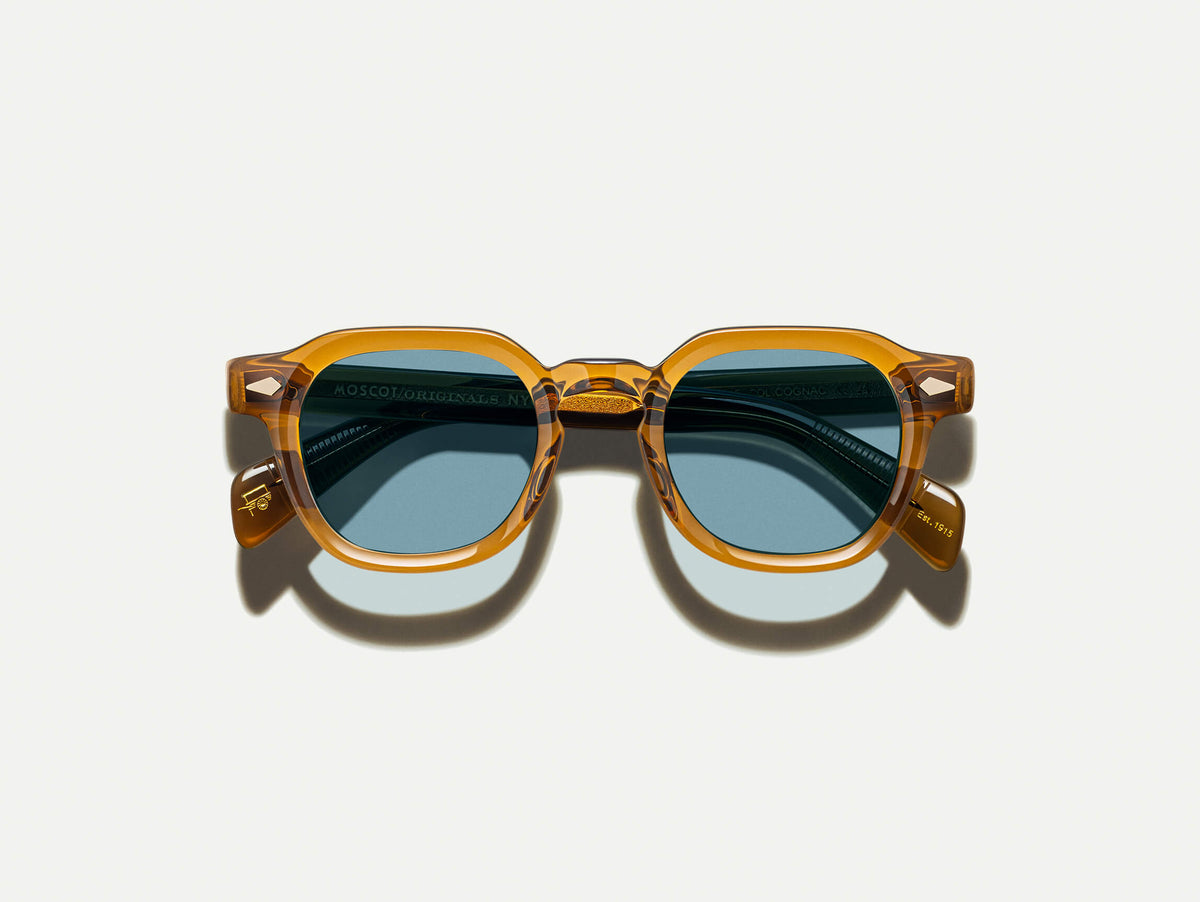 The DOLT SUN in Cognac with Mineral Blue Tinted Lenses