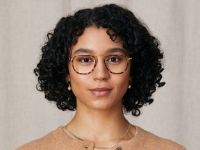 Model is wearing The FANAGLE in size 53 in Tortoise