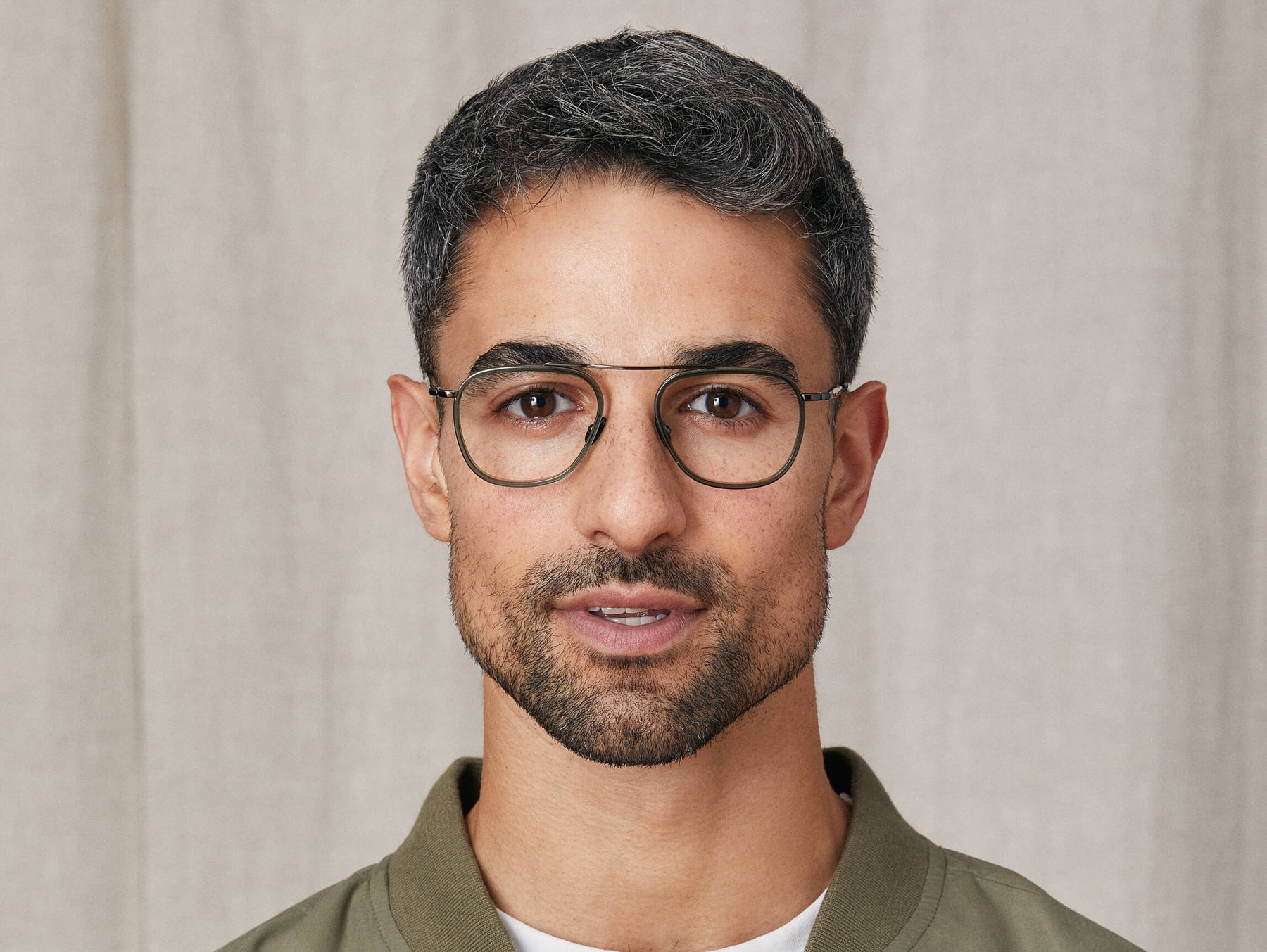 Model is wearing The FANAGLE in size 50 in Pine