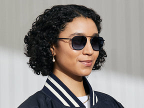 Model is wearing The FANAGLE SUN in Navy in size 53 with Denim Blue Tinted Lenses