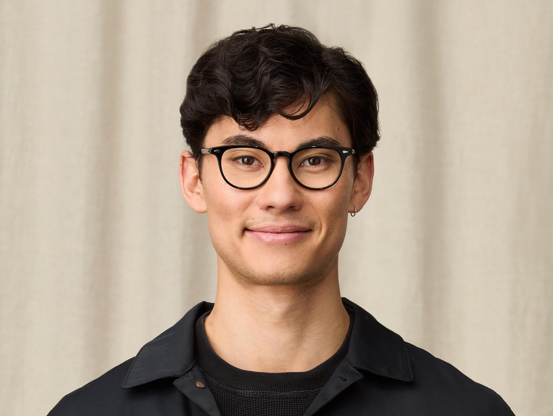 Model is wearing The FEVEL in size 49 in Black