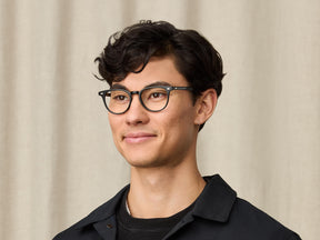 Model is wearing The FEVEL in size 49 in Black