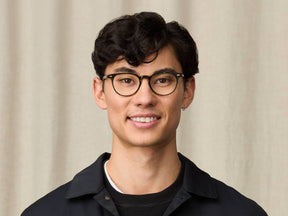 Model is wearing The FEVEL in size 49 in Dark Green