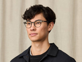 Model is wearing The FEVEL in size 49 in Dark Green