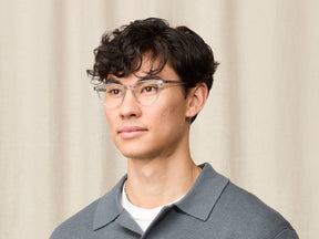 Model is wearing The FEVEL in size 49 in Light Grey