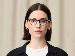 Model is wearing The FEVEL in size 46 in Navy