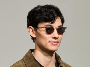 Model is wearing The FEVEL SUN in Light Grey in size 49 with G-15 Tinted Lenses