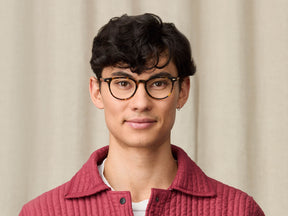 Model is wearing The FEVEL in size 49 in Tortoise