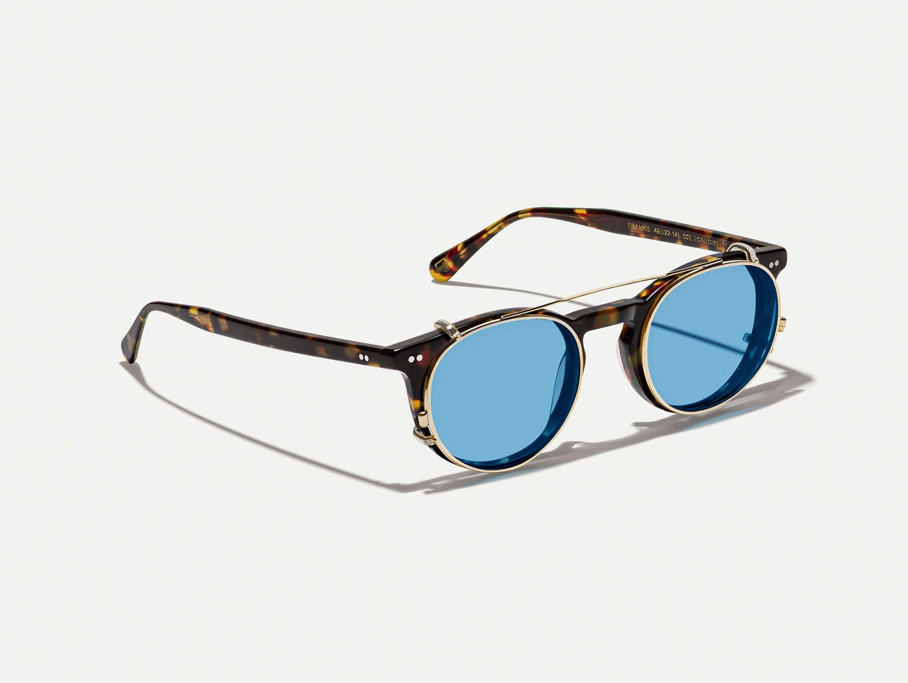 The FRANKIE CLIP  in Gold with Celebrity Blue Tinted Lenses