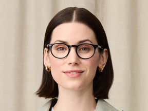 Model is wearing The FRANKIE in size 48 in Black