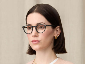 Model is wearing The FRANKIE in size 48 in Matte Black