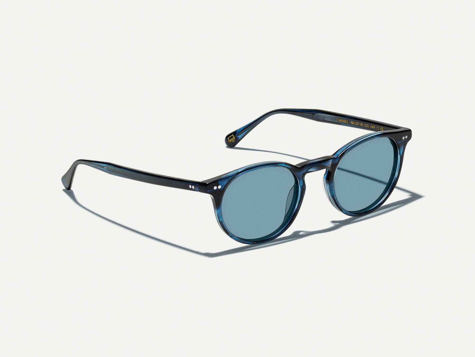 The FRANKIE SUN in Ink with Mineral Blue Tinted Lenses