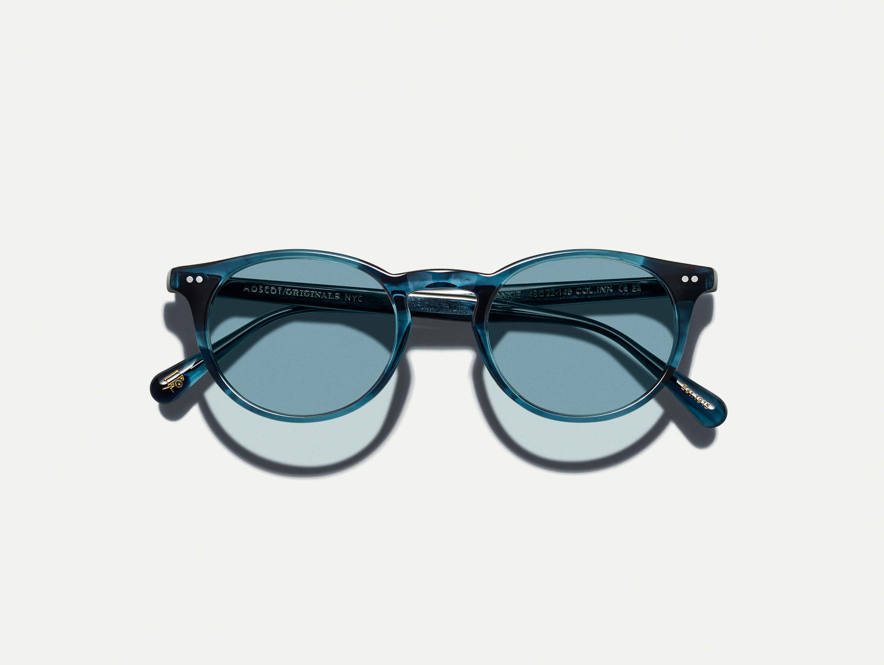The FRANKIE SUN in Ink with Mineral Blue Tinted Lenses