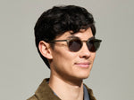 Model is wearing The FRANKIE SUN in Sage in size 51 with G-15 Tinted Lenses