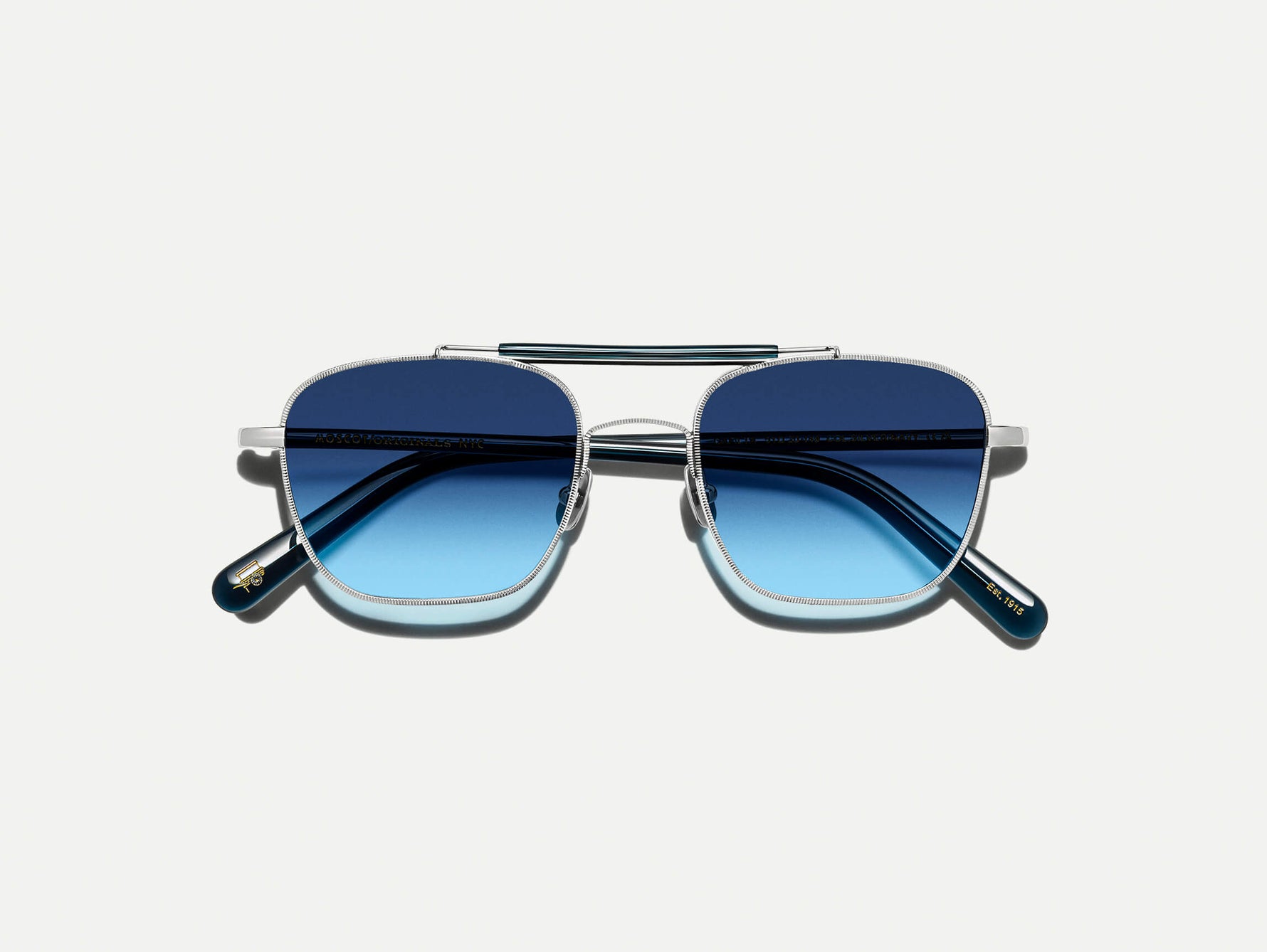 #color_silver/navy | The GAFILTA SUN in Silver/Navy with Denim Blue Tinted Lenses