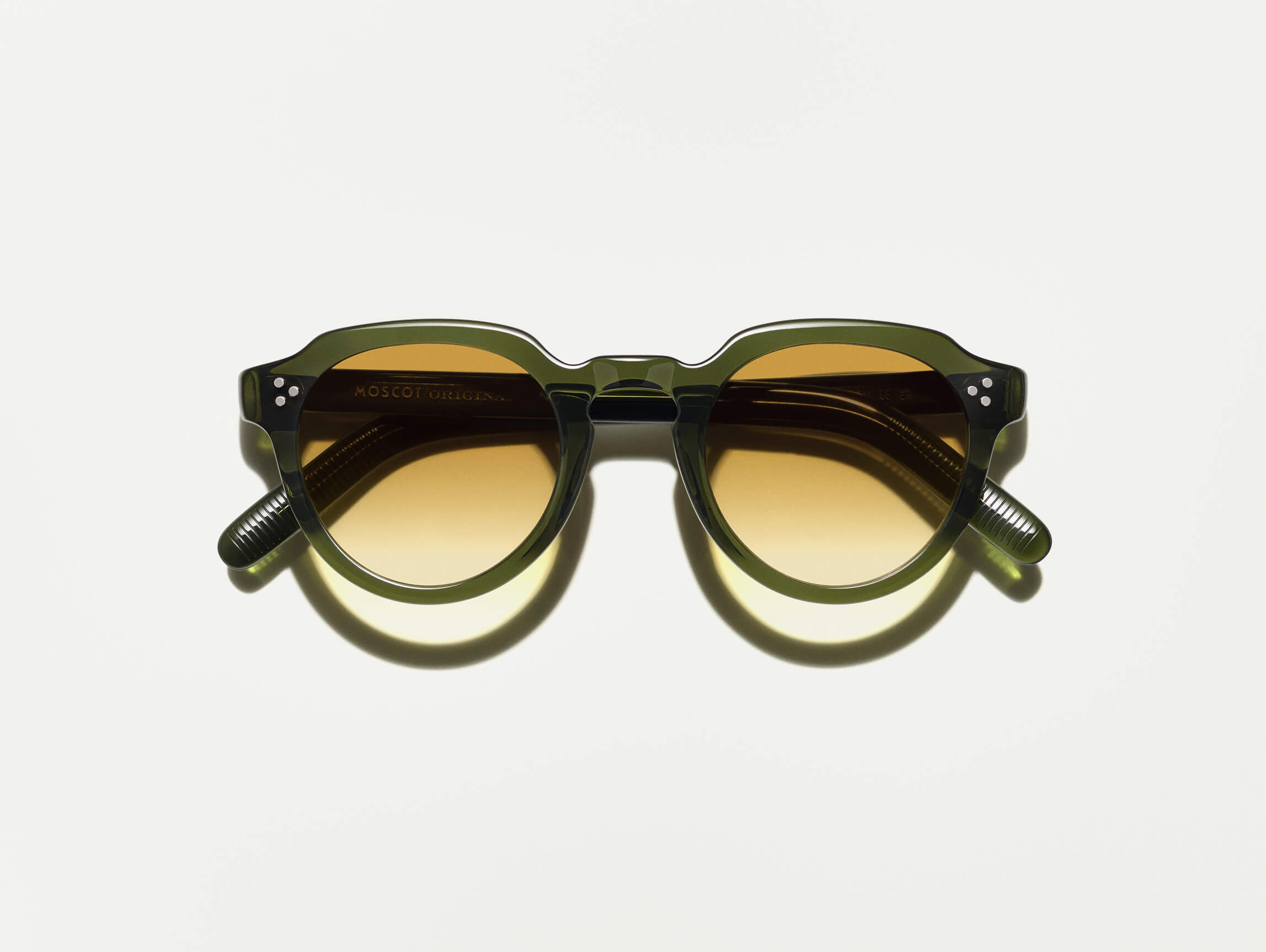 The GAVOLT SUN in Dark Green with Chestnut Fade Tinted Lenses