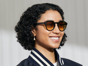 Model is wearing The GAVOLT SUN in Dark Green in size 48 with Chestnut Fade Tinted Lenses