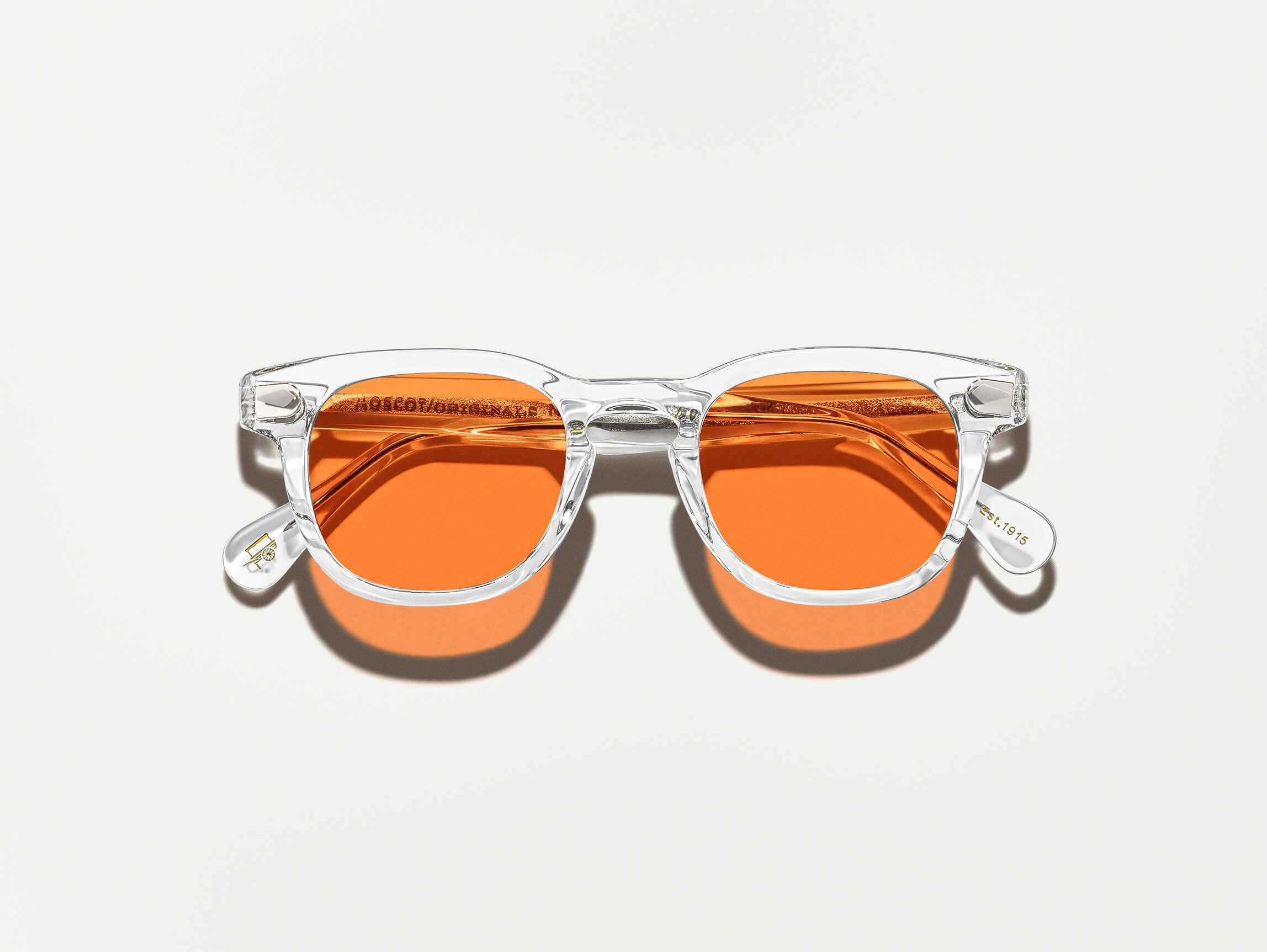 The GELT Crystal with Woodstock Orange Tinted Lenses