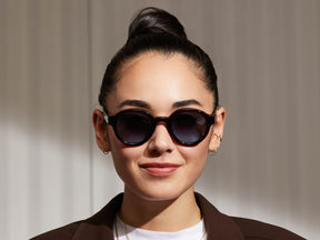 Model is wearing The GREPS SUN in Burgundy in size 47 with Denim Blue Tinted Lenses