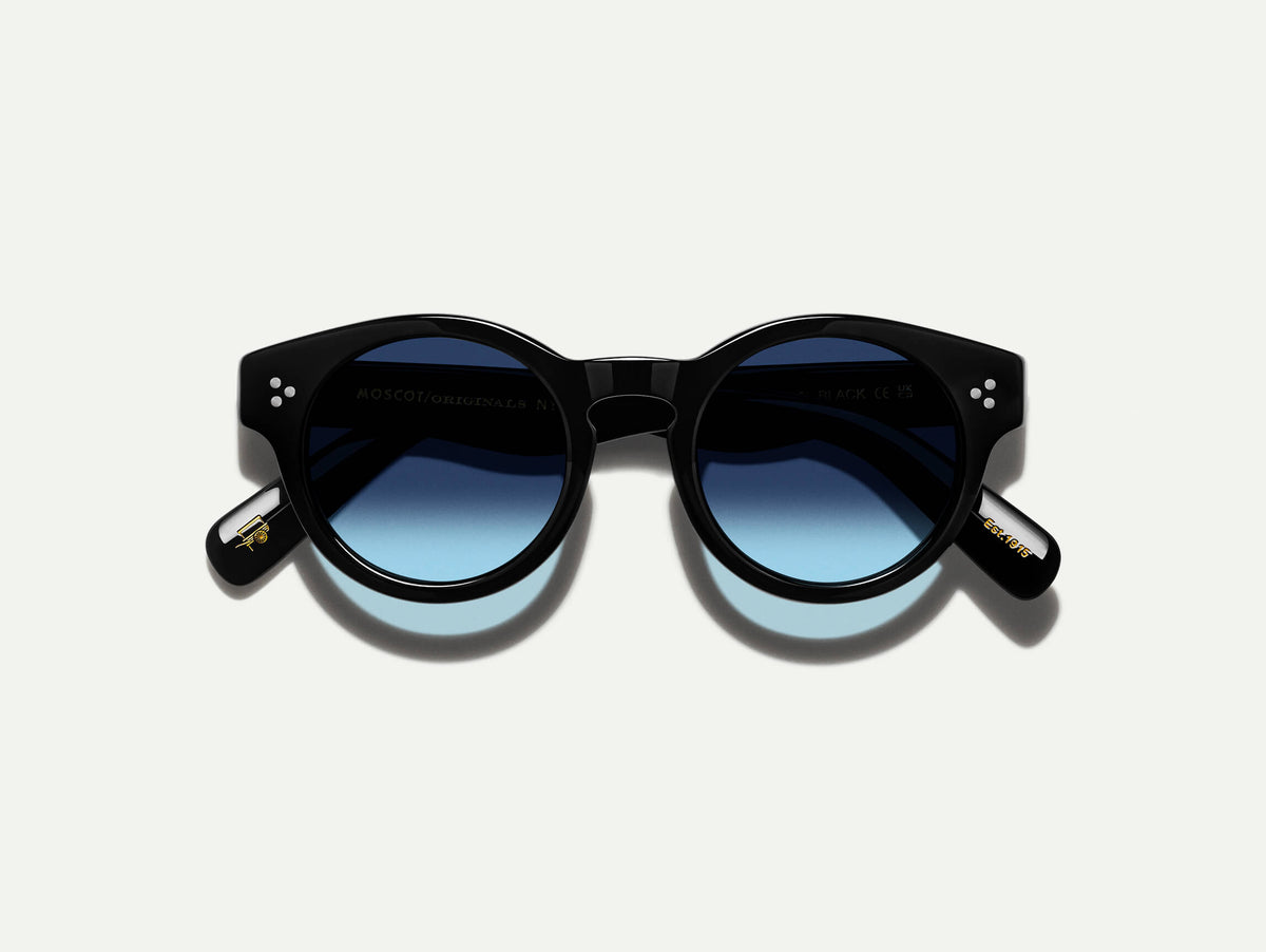 The GRUNYA SUN in Black with Denim Blue Tinted Lenses